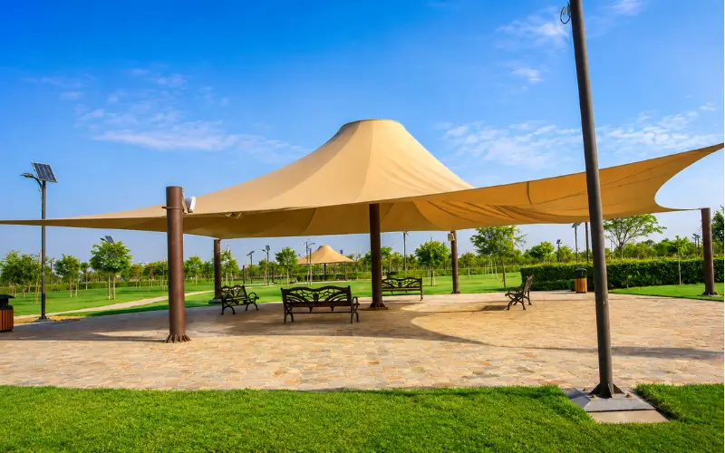 Shaded seating areas at Quranic Park Dubai